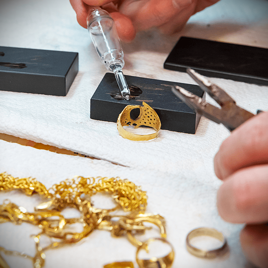 Acid purity test being carried out on a gold ring